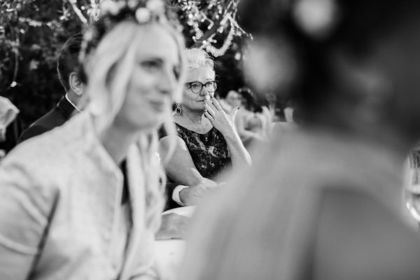 Capture of the moved bride´s mother through the guests.
