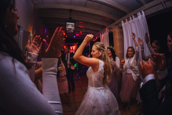 The bride is dancing at her wedding party.