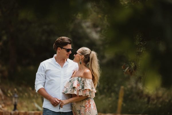 Portrait of the bride and groom in an holiday summer look.